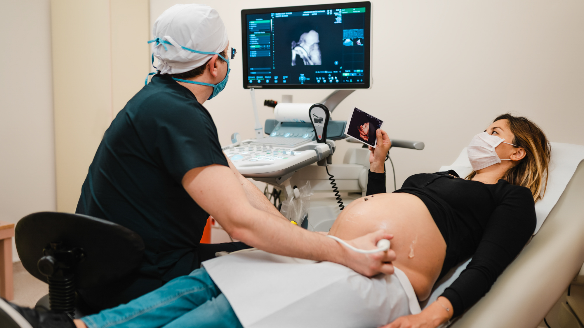 nurse checking status of pregnant woman