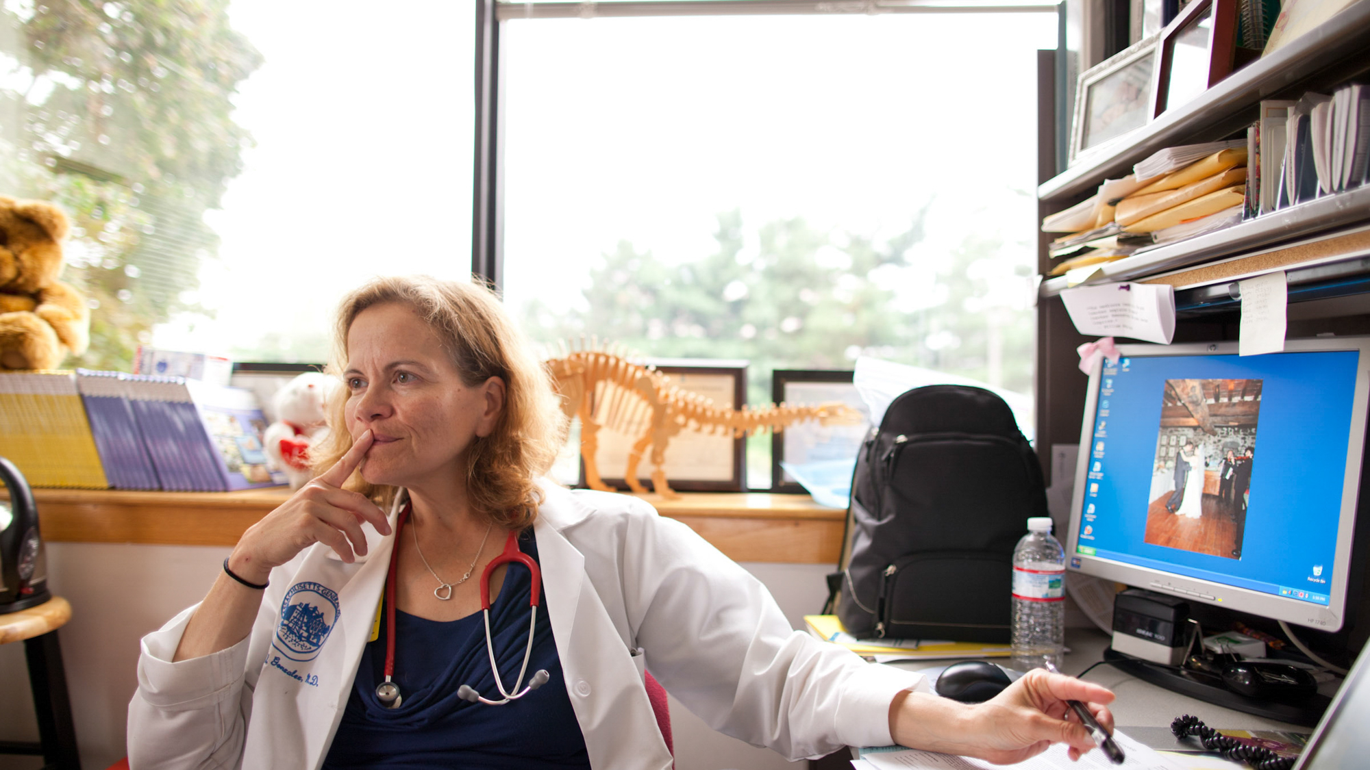 thoughtful female physician in office