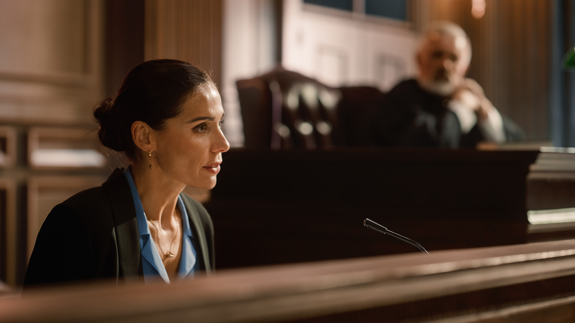 a person in the witness box at court