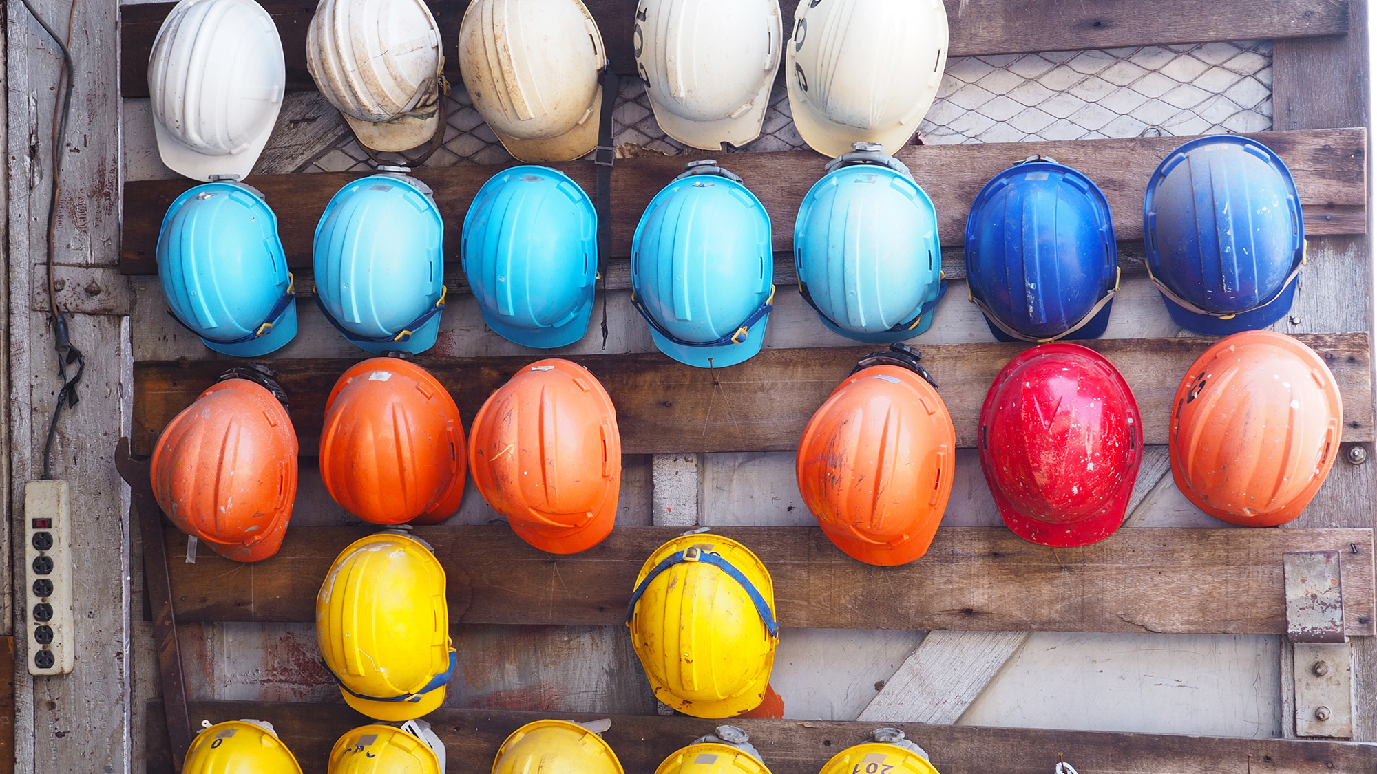 a collection of hard hats awaiting use