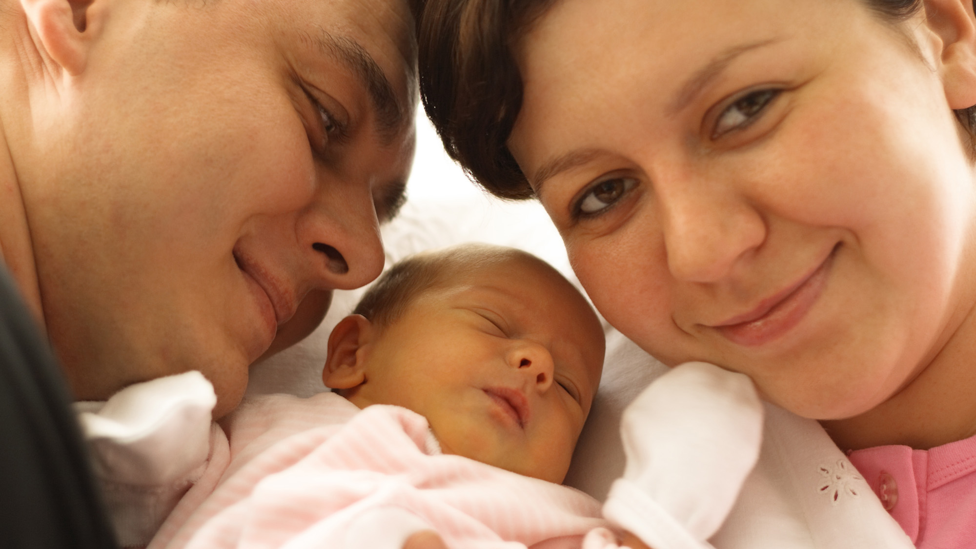 parents with their newborn