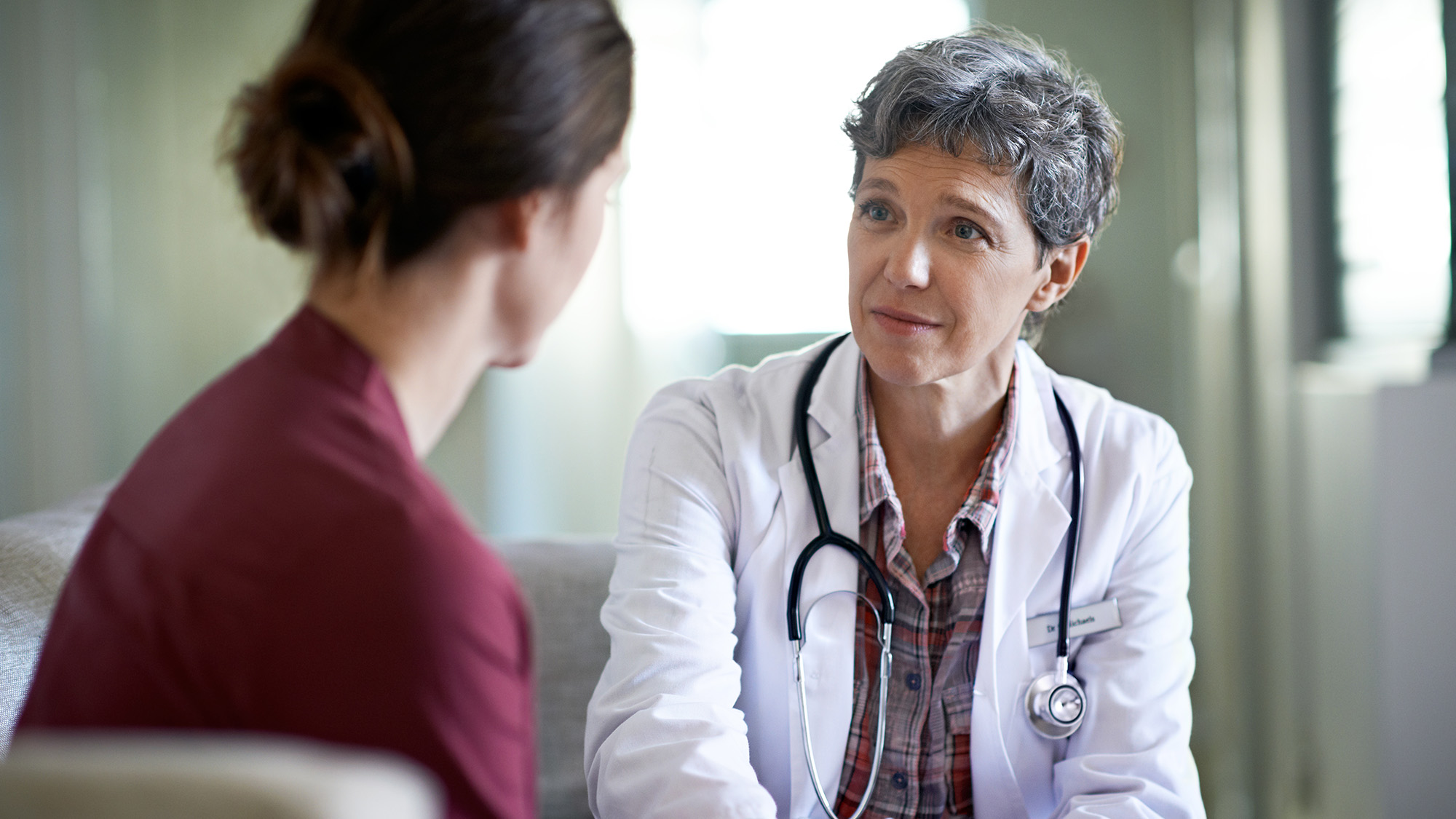 doctor talking with a patient