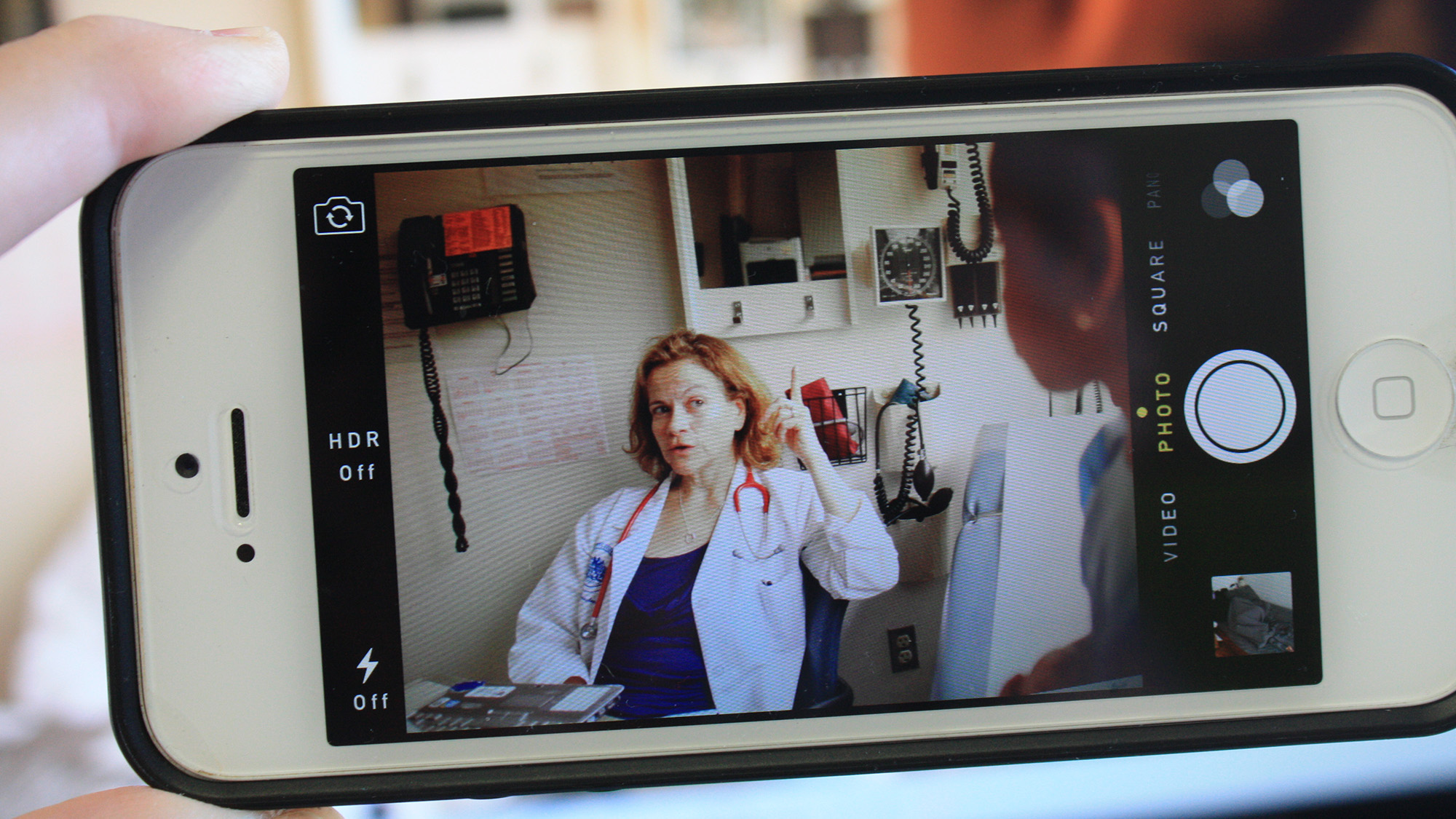 doctor shown on phone