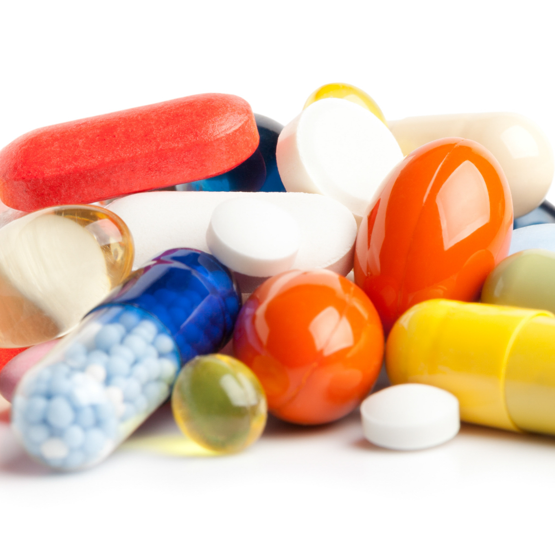 drug tablets in a colorful pile