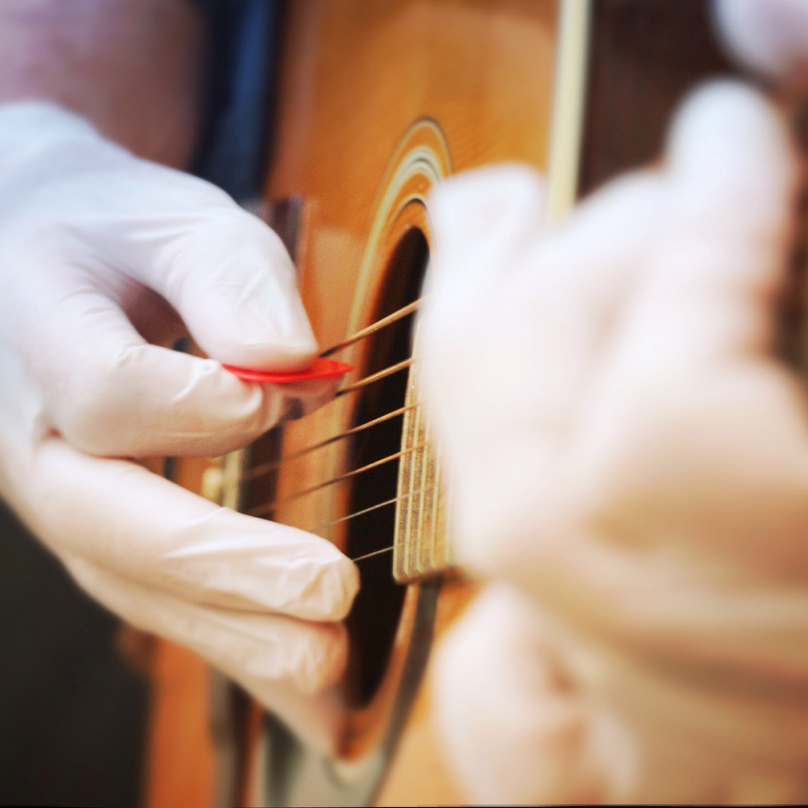 clinician playing guitar