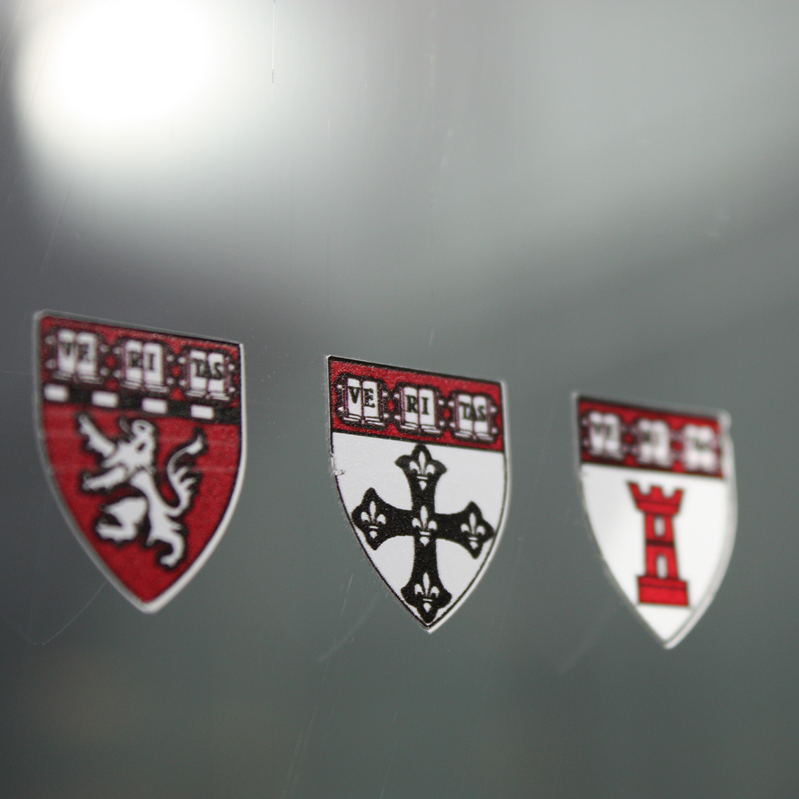 assorted Harvard insignia