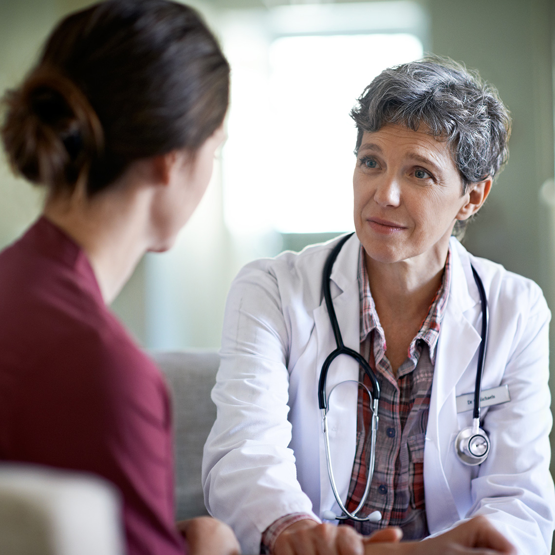 doctor talking with a patient