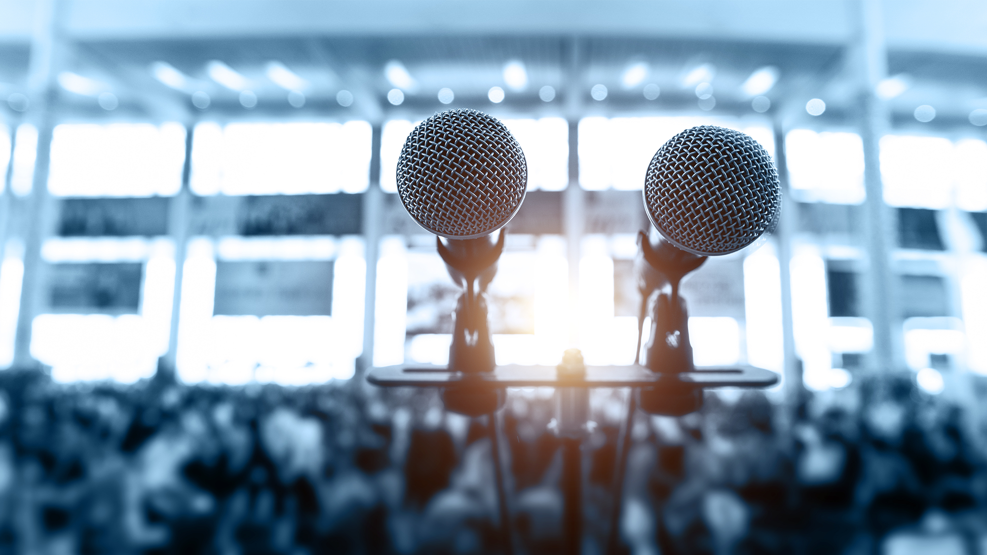 microphones before an audience