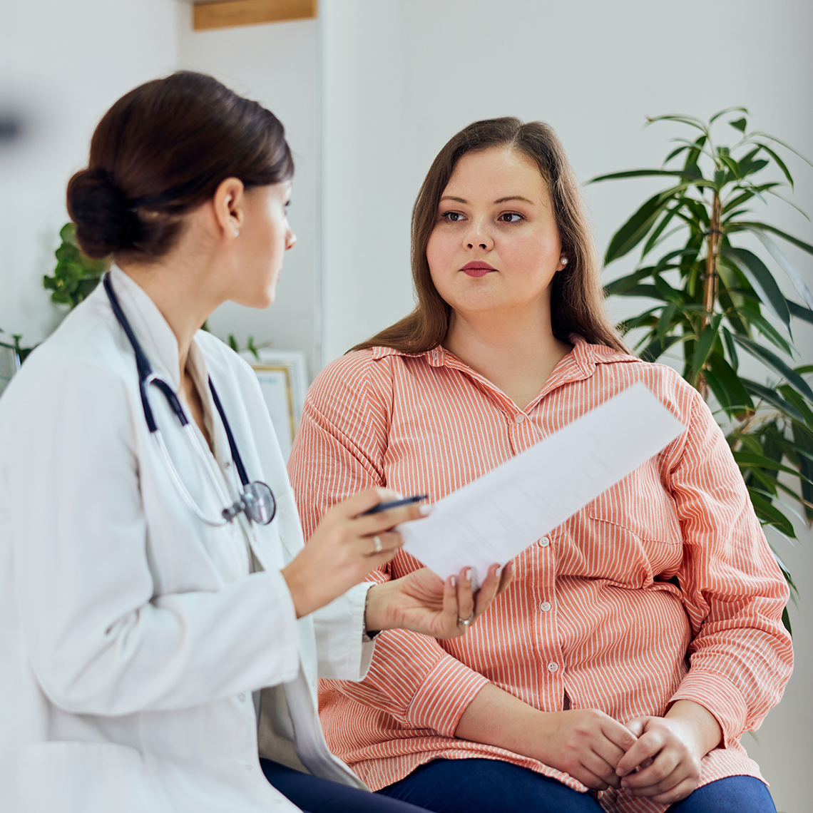 woman in conversation with clinician