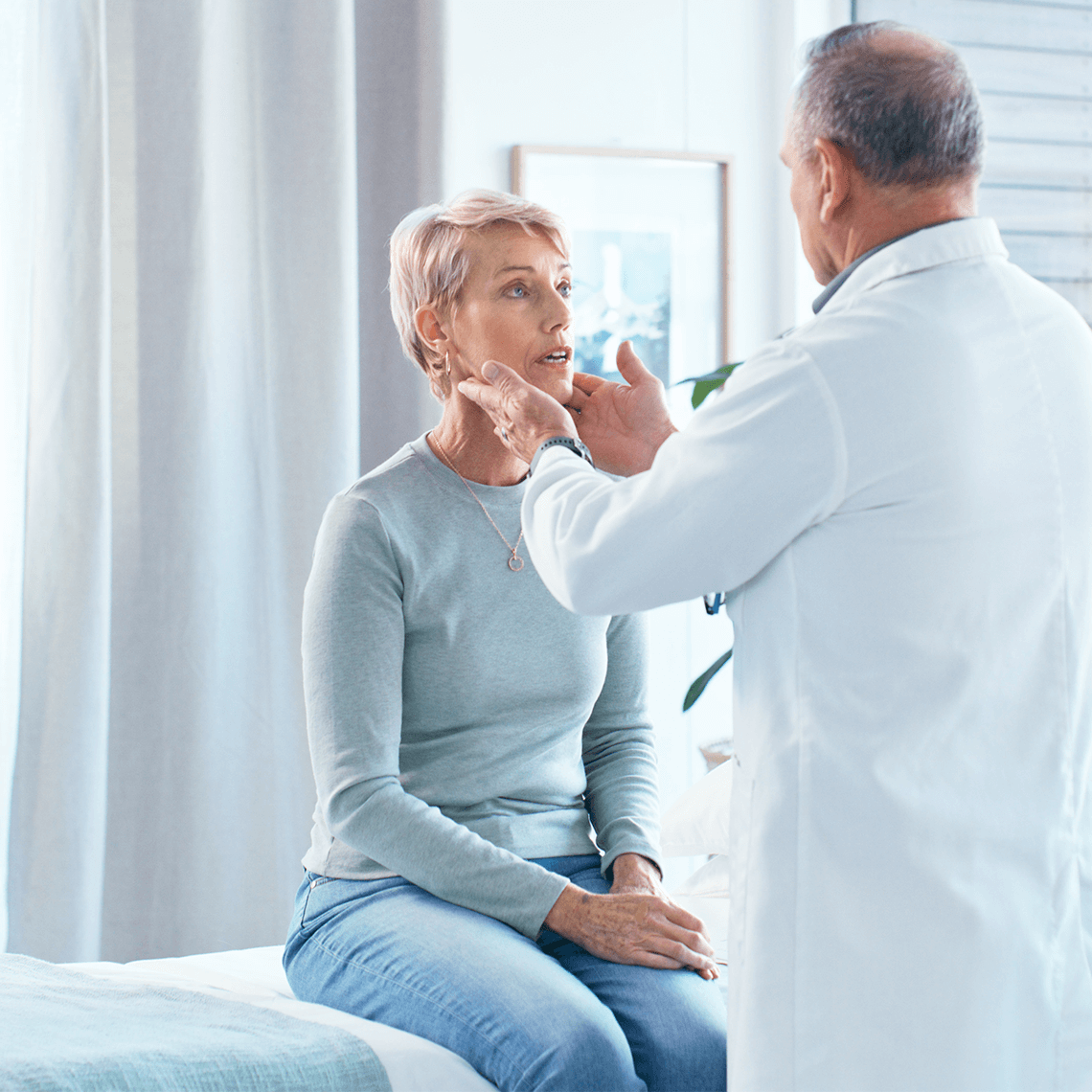 male doctor with female patient