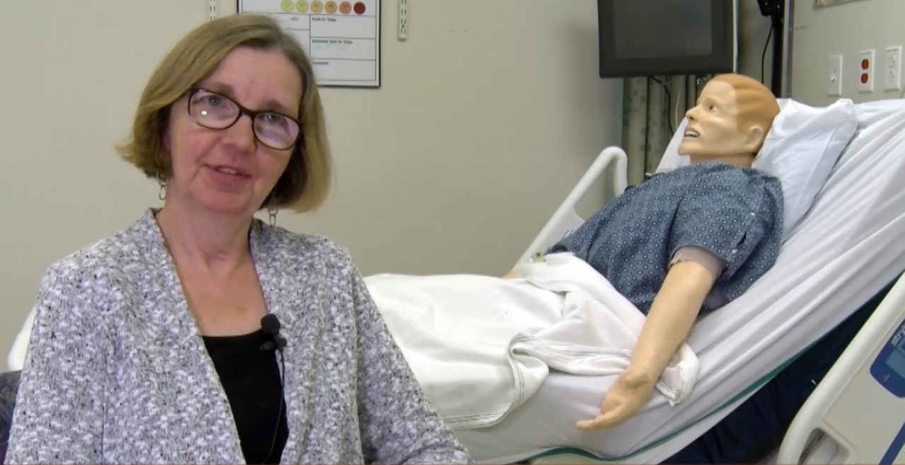 nurse with simulated patient